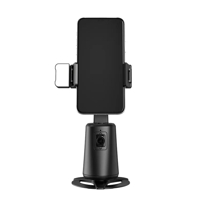 Black desktop phone bracket with intelligent face tracking camera and LED ribbon lights, remote control on desk