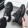 Men's breathable mesh lace-up sneaker in beige and black with rubber sole and platform heel