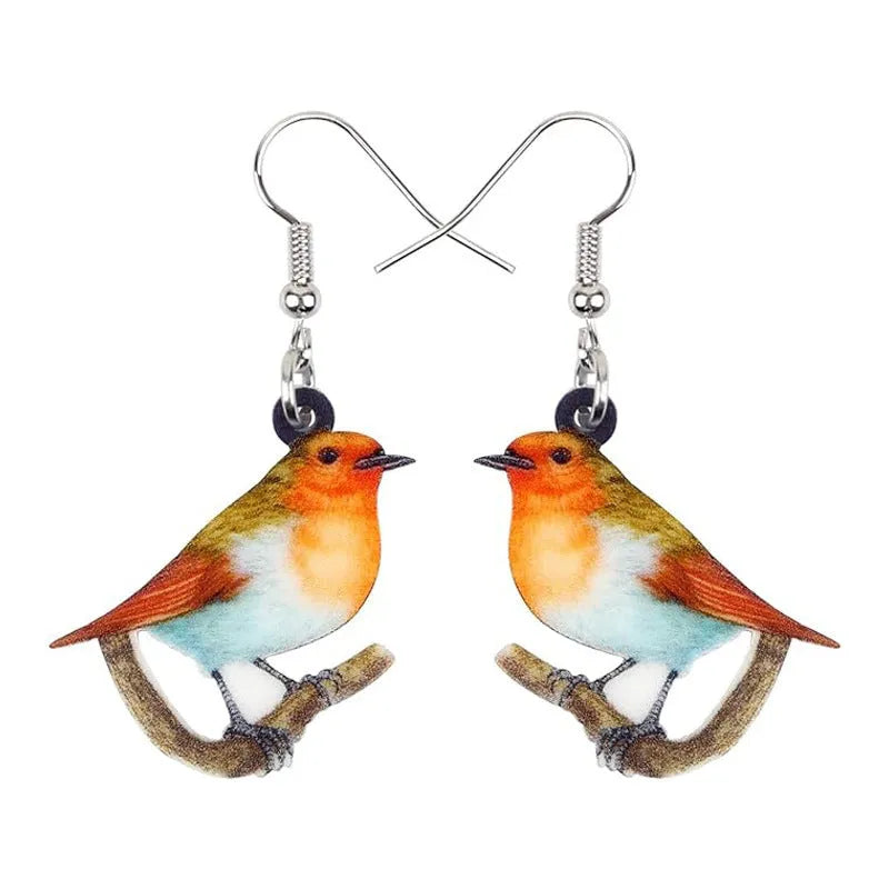 Acrylic blue titmouse pendant earrings with geometric animal zodiac designs and snake pattern details