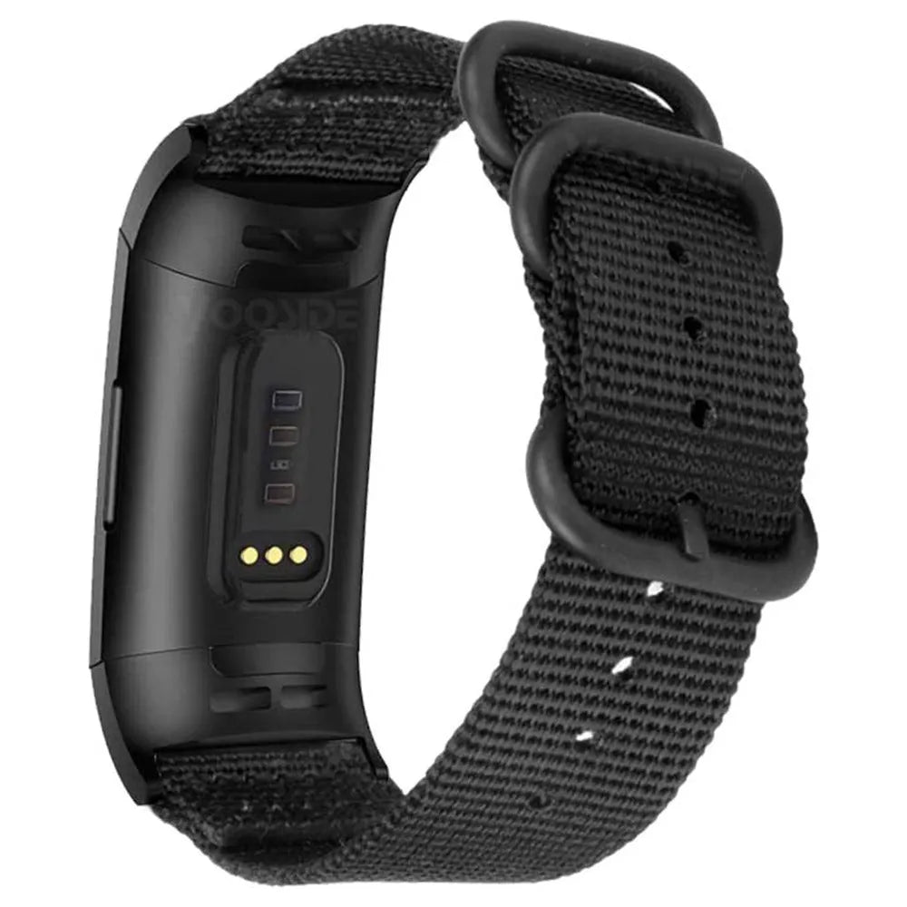 Fitbit Charge nylon replacement strap with a three-ring metal buckle shown in multiple colour options.