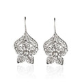 Silver alloy hollow flower and leaf-shaped earrings for women, retro simple design
