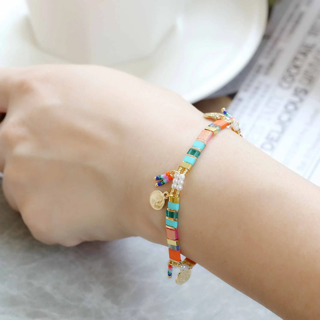 Women's manual beaded bracelet with imitation pearl and coloured glass beads in six style options