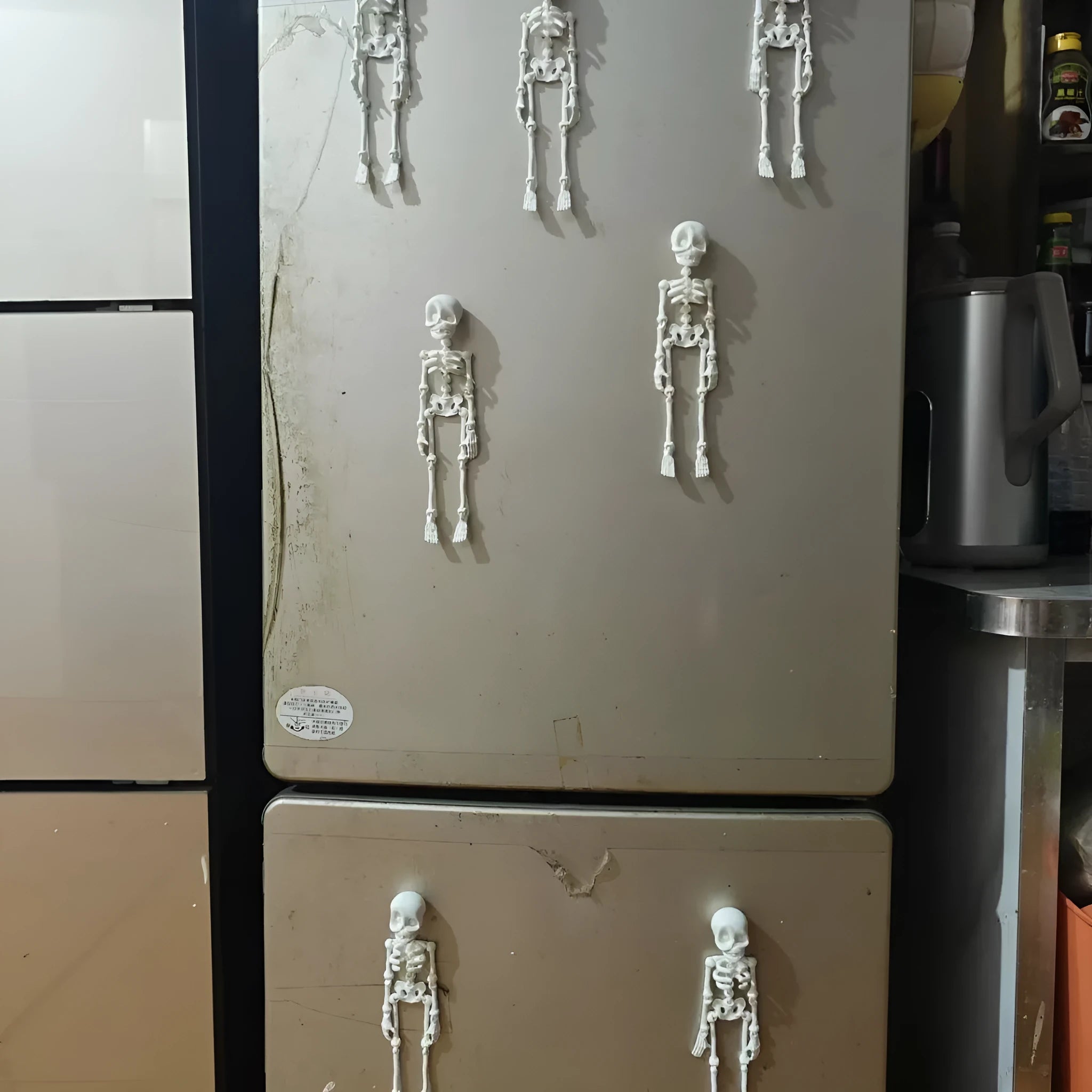 3D printed white skull refrigerator magnet showing modern art design at 18cm height