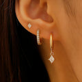 Ladies three-piece earring set with geometric designs and inlaid zircon accents