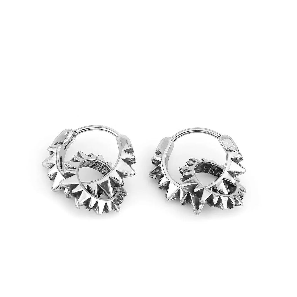 Stainless steel round ring earrings with polished steel finish and retro design