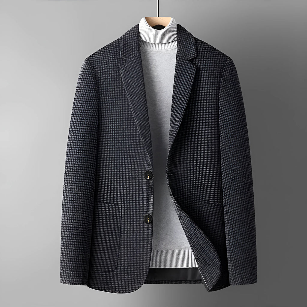Men's solid colour slim fit wool suit jacket on a hanger.