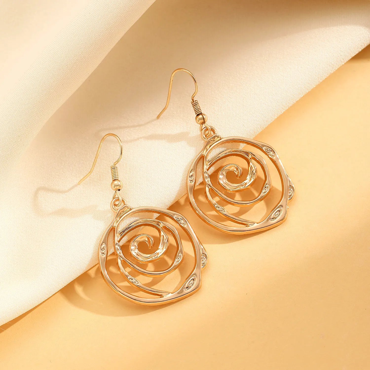 Spiral donut geometric jewellery set with necklace bracelet earrings in gold finish
