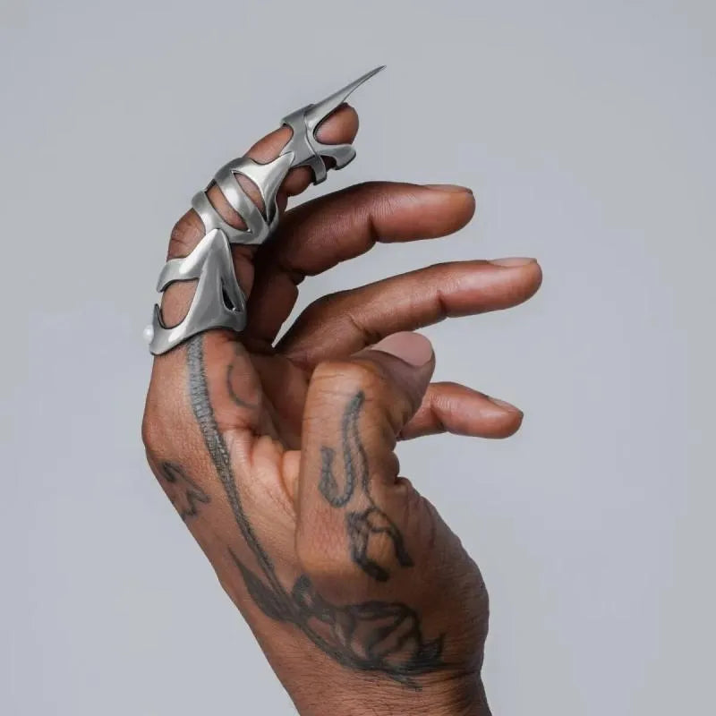 Silver punk armour style finger stall made from alloy metal