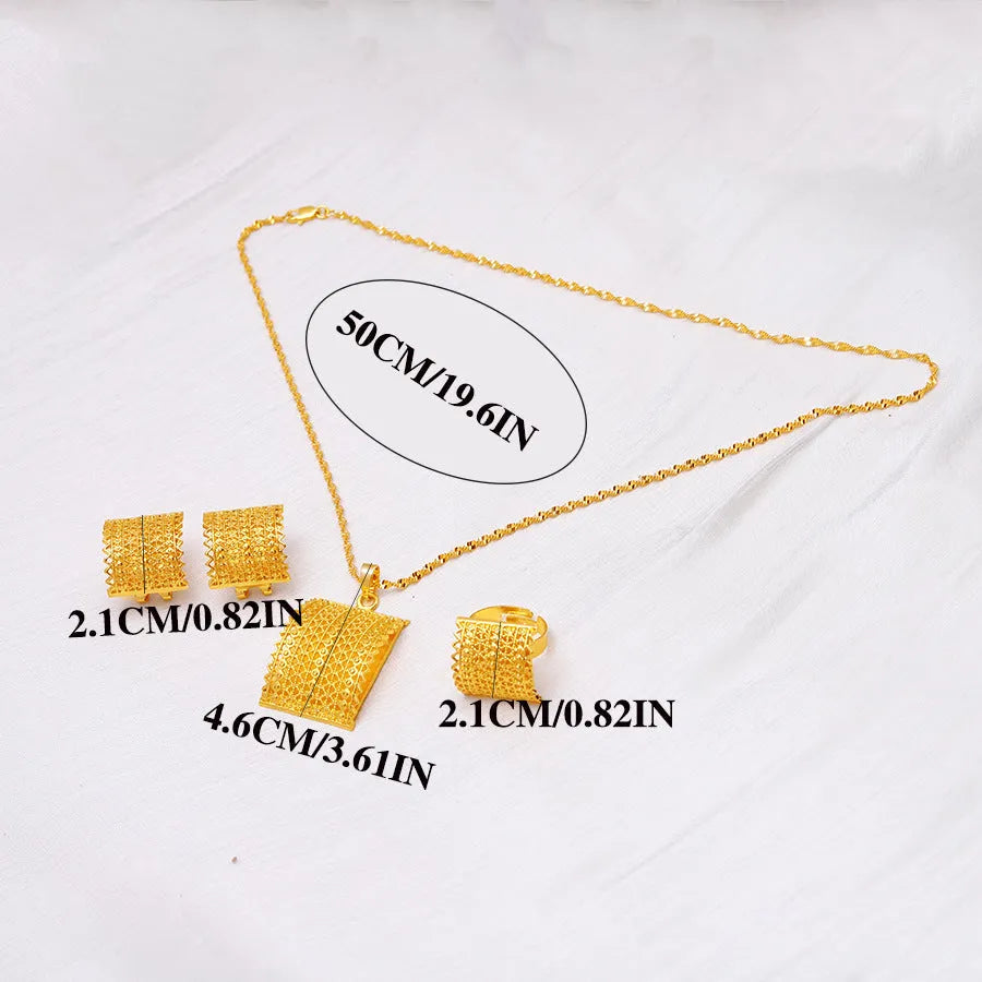 Gold colour copper bridal jewellery set with necklace, earrings, and ring on display