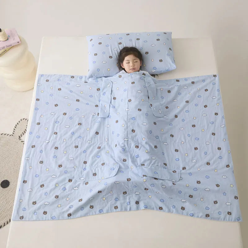 Light blue anti-kick summer blanket with antibacterial filler on a bed