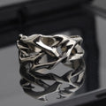 Geometric thorn flower ring with adjustable opening in J2150 colour