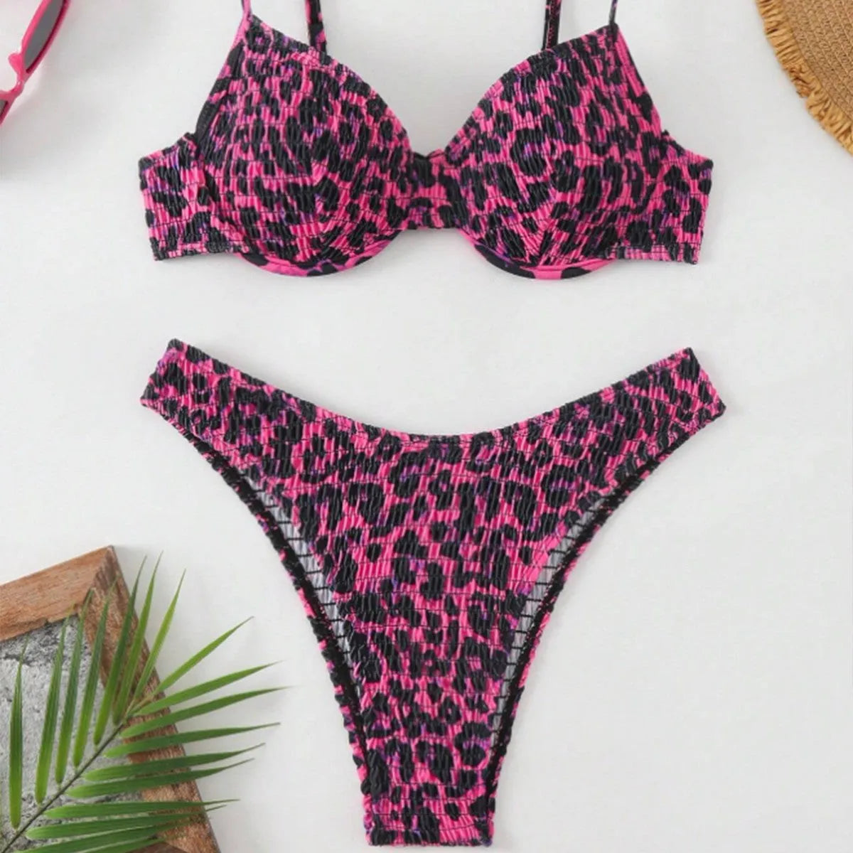 Women's leopard print bikini set with backless design in brown and red mix colours.
