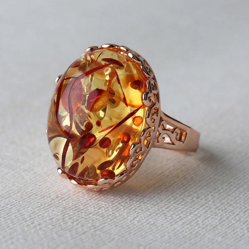 Beeswax amber ethnic ring with New Amber Type A stone on adjustable alloy band