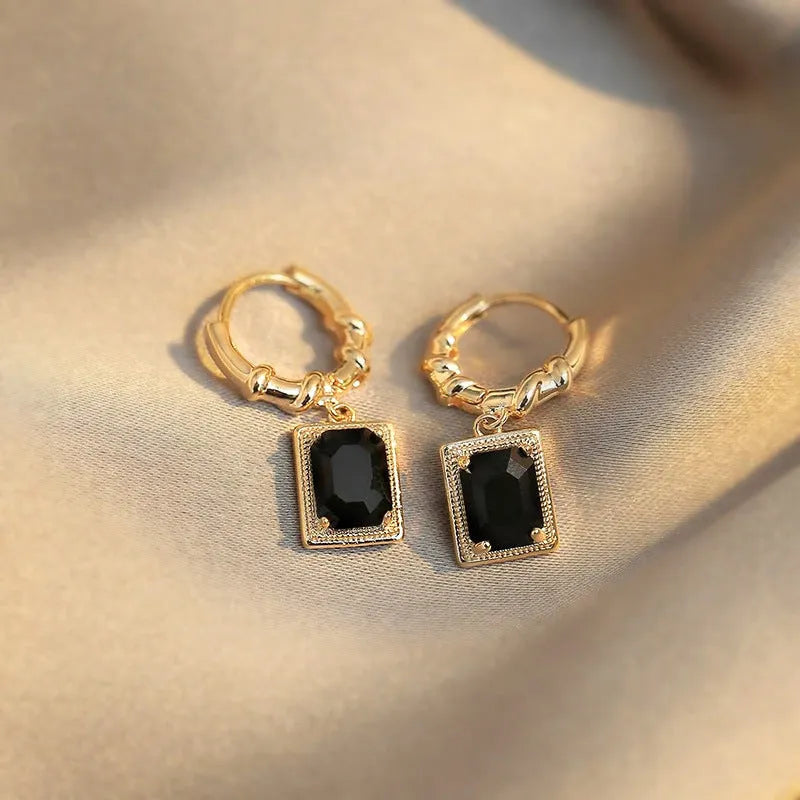 Black geometric copper earrings with zircon stones in French court drop design
