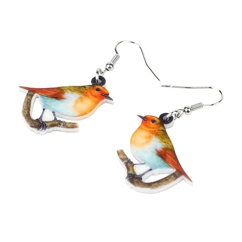Acrylic blue titmouse pendant earrings with geometric animal zodiac designs and snake pattern details