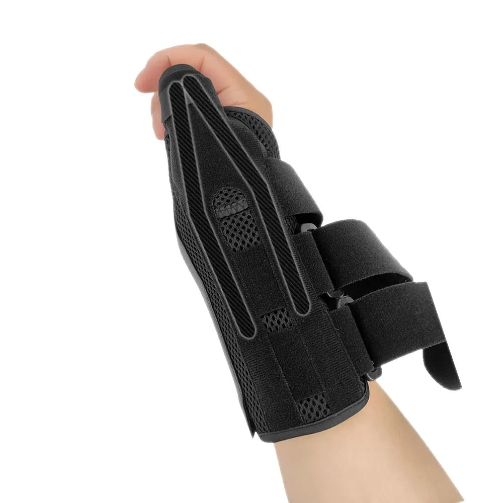 Carbon fibre sports wrist guard with thumb strap, shown in black with grey edging detail.