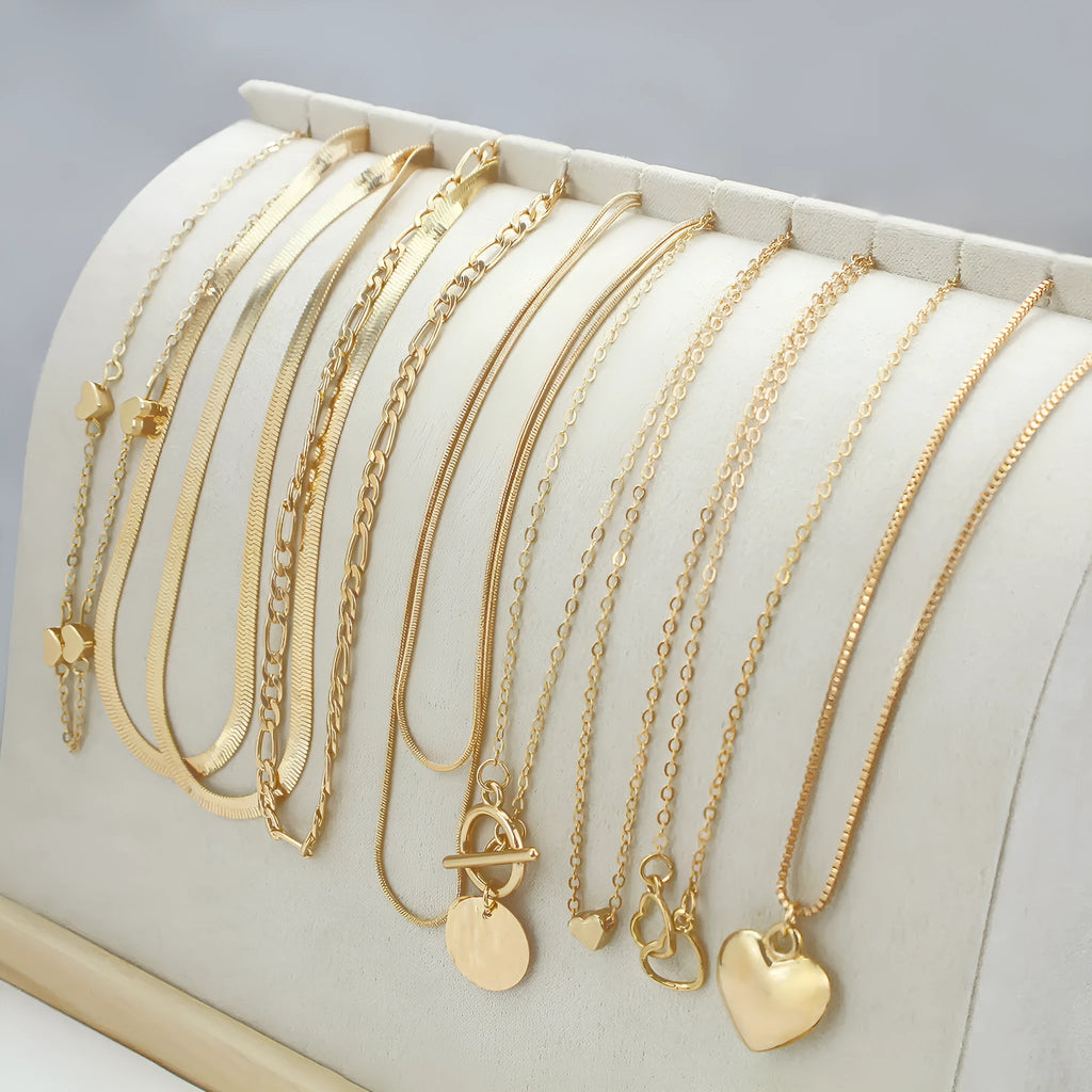 10-piece women's gold electroplated necklace set with adjustable length and snake bone chain design