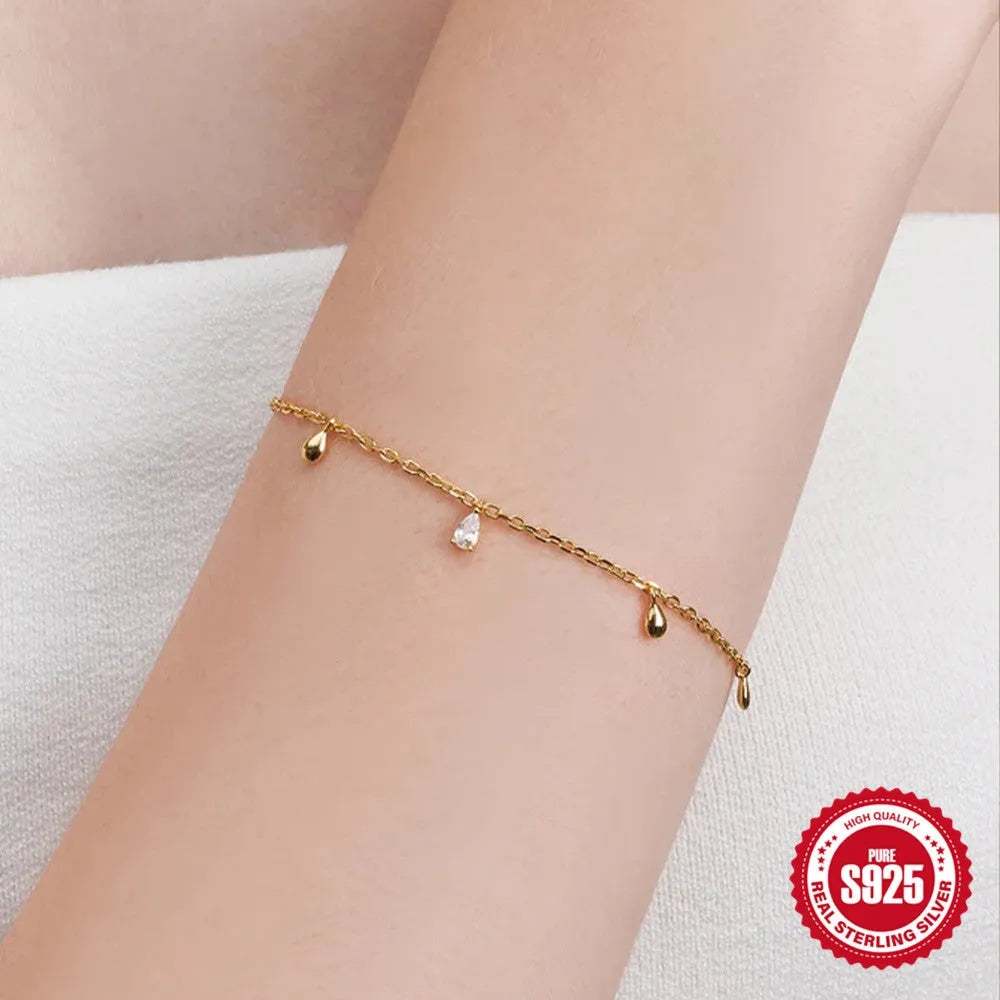 Gold S925 sterling silver water drop diamond pendant bracelet for women on white background
