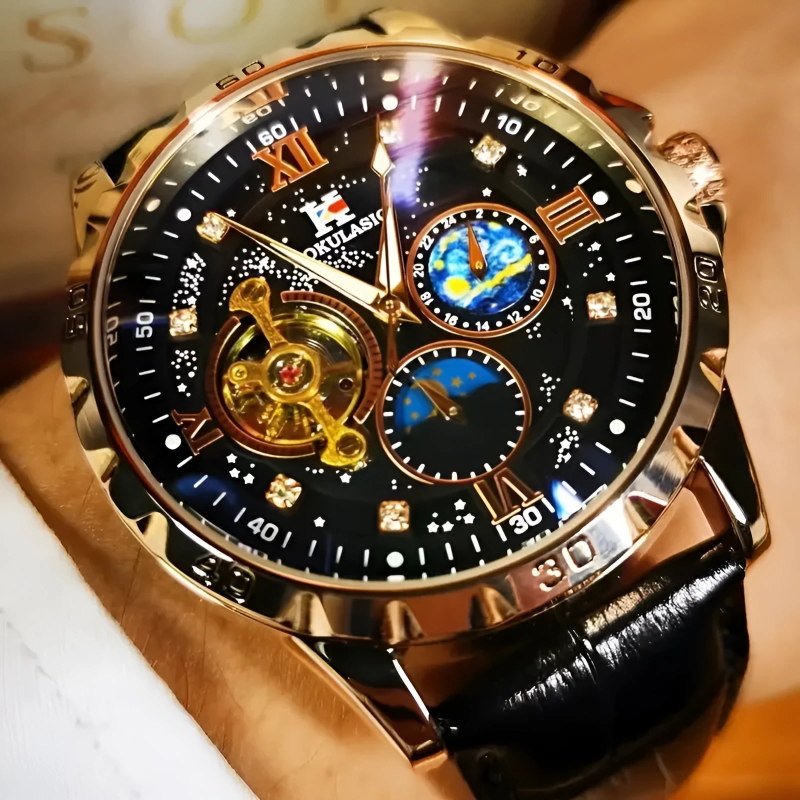 Men's black and rose gold automatic watch with a skeleton dial and leather strap.