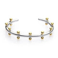 Adjustable C-shaped bracelet with round stainless steel bean beads on an alloy chain.