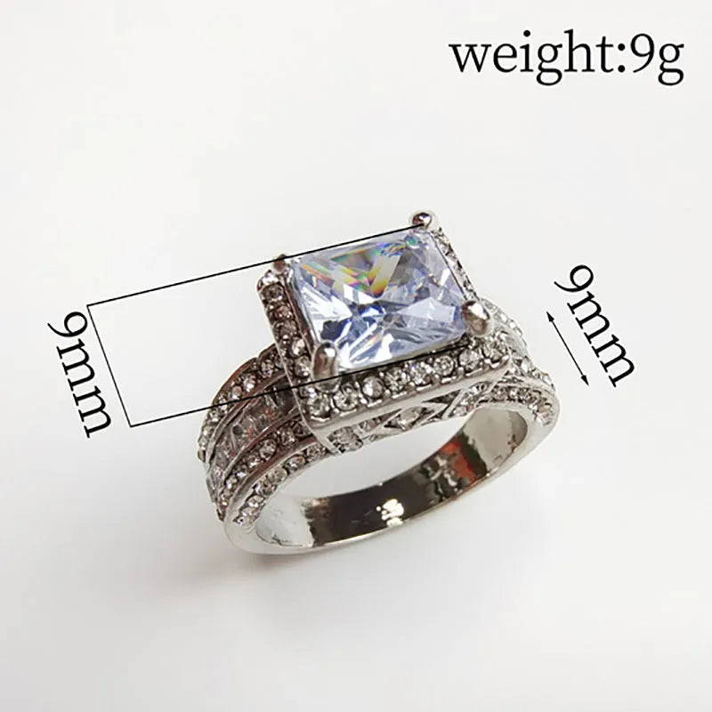 Silver-plated geometric women's ring in gold or white electroplated finish showing angular design with round elements