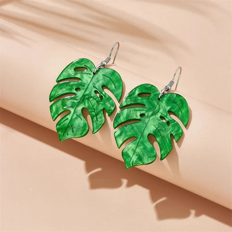 Acrylic drop earrings with coconut design on alloy hooks, shown in five colour variations.