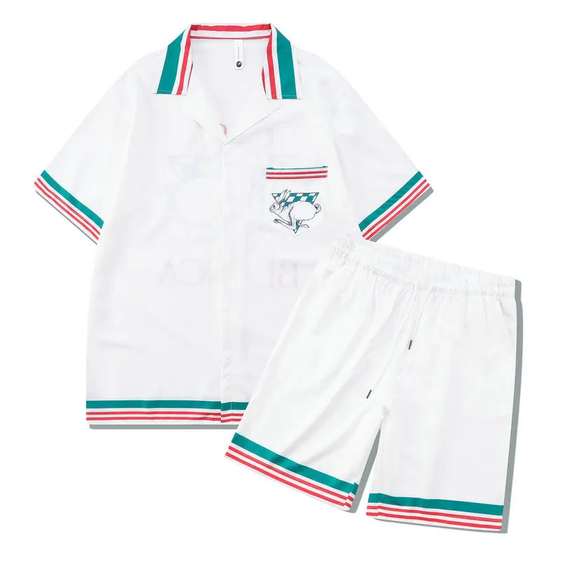 Plaid patterned beach outfit set with short sleeve shirt and matching trousers on a man