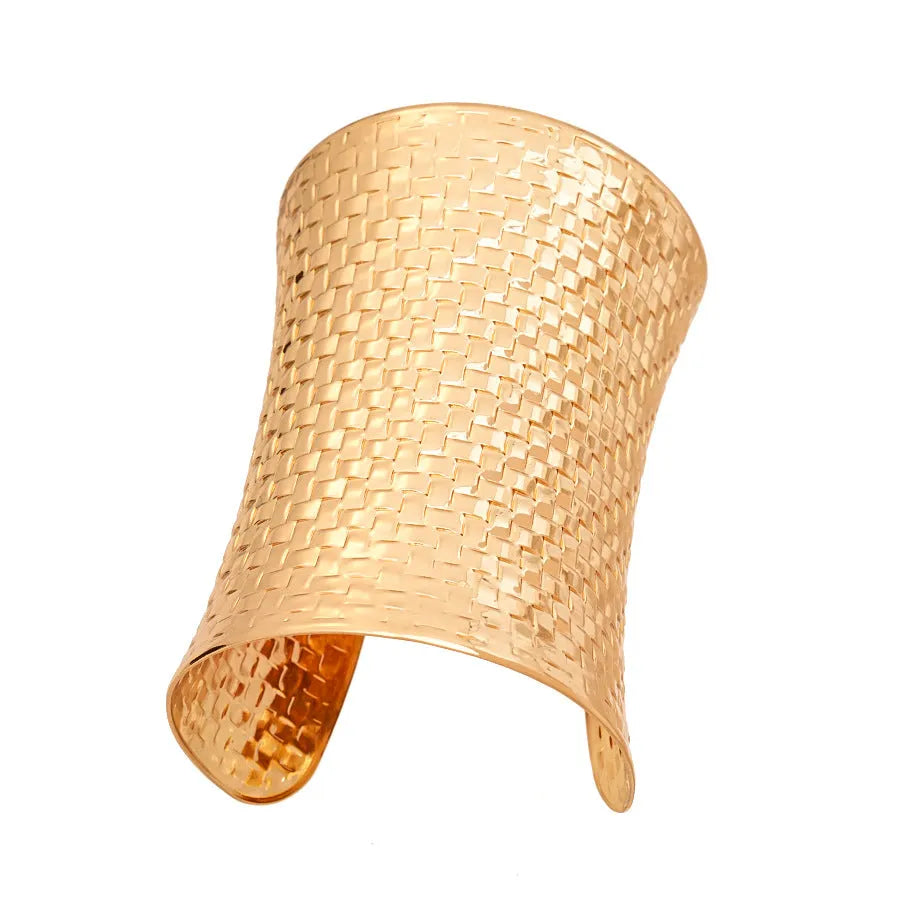 Women's vintage exaggerated round metal bracelet in gold finish with electroplated surface