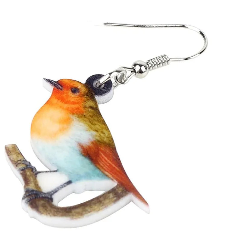 Acrylic blue titmouse pendant earrings with geometric animal zodiac designs and snake pattern details