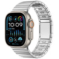 Stainless steel magnetic buckle Apple Watch strap in business style on a wrist.