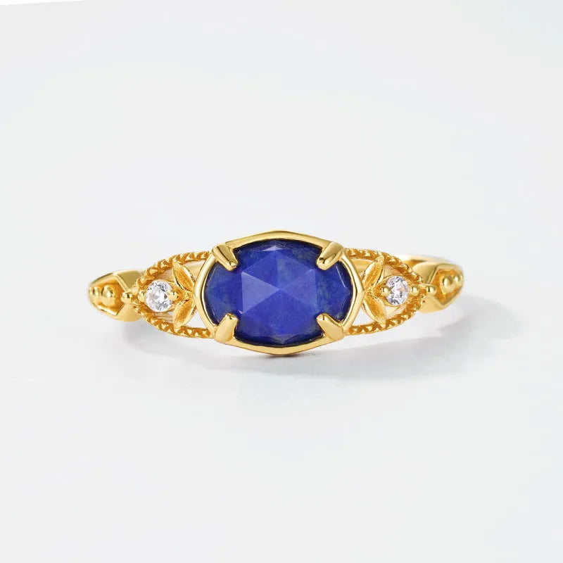 Geometric oval silver alloy ring with lapis lazuli stone centrepiece