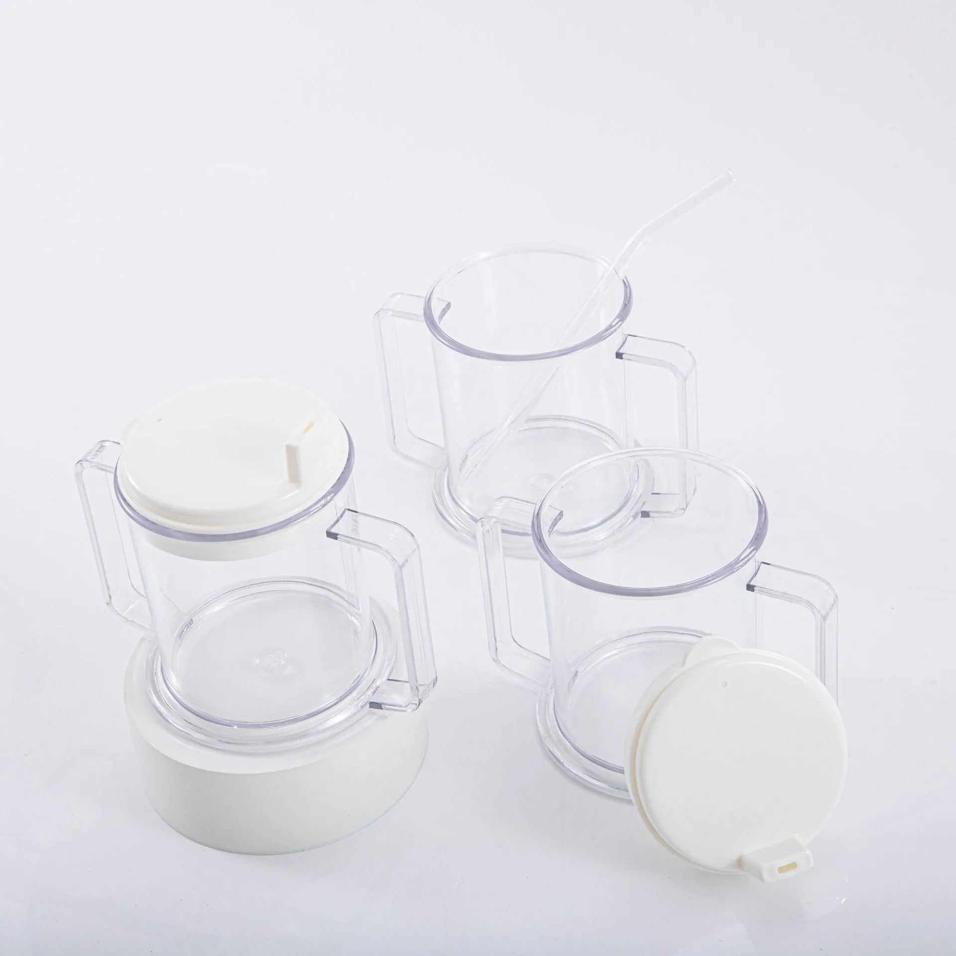 Transparent spill-proof drinking cup with modern design measuring 14cm tall