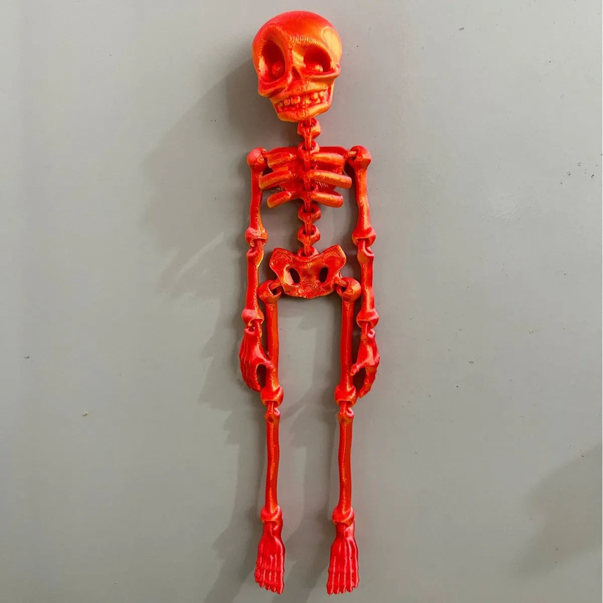 3D printed white skull refrigerator magnet showing modern art design at 18cm height