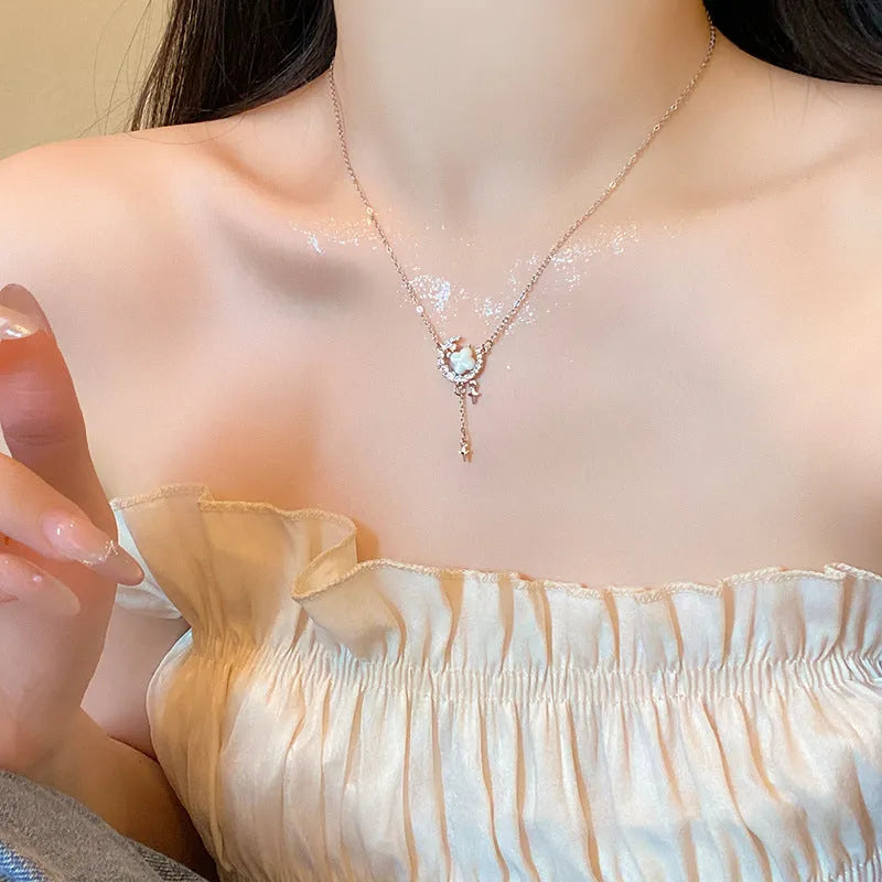 Women's star-shaped necklace with moon decoration on adjustable copper chain in gold finish