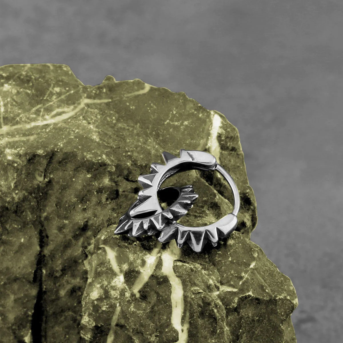 Stainless steel round ring earrings with polished steel finish and retro design