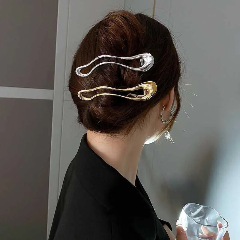 Women's zinc alloy hair barrette in gold polished finish showing square shape design