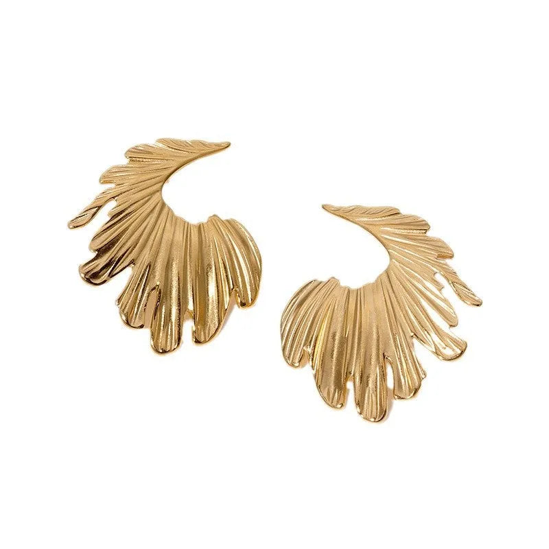 Pair of gold electroplated stainless steel leaf-shaped stud earrings on a white background