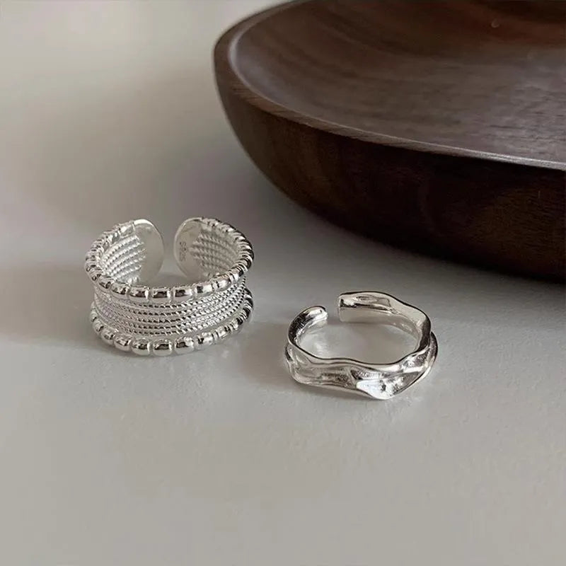 Women's copper alloy ring with woven twisted multilayer geometric design and adjustable opening