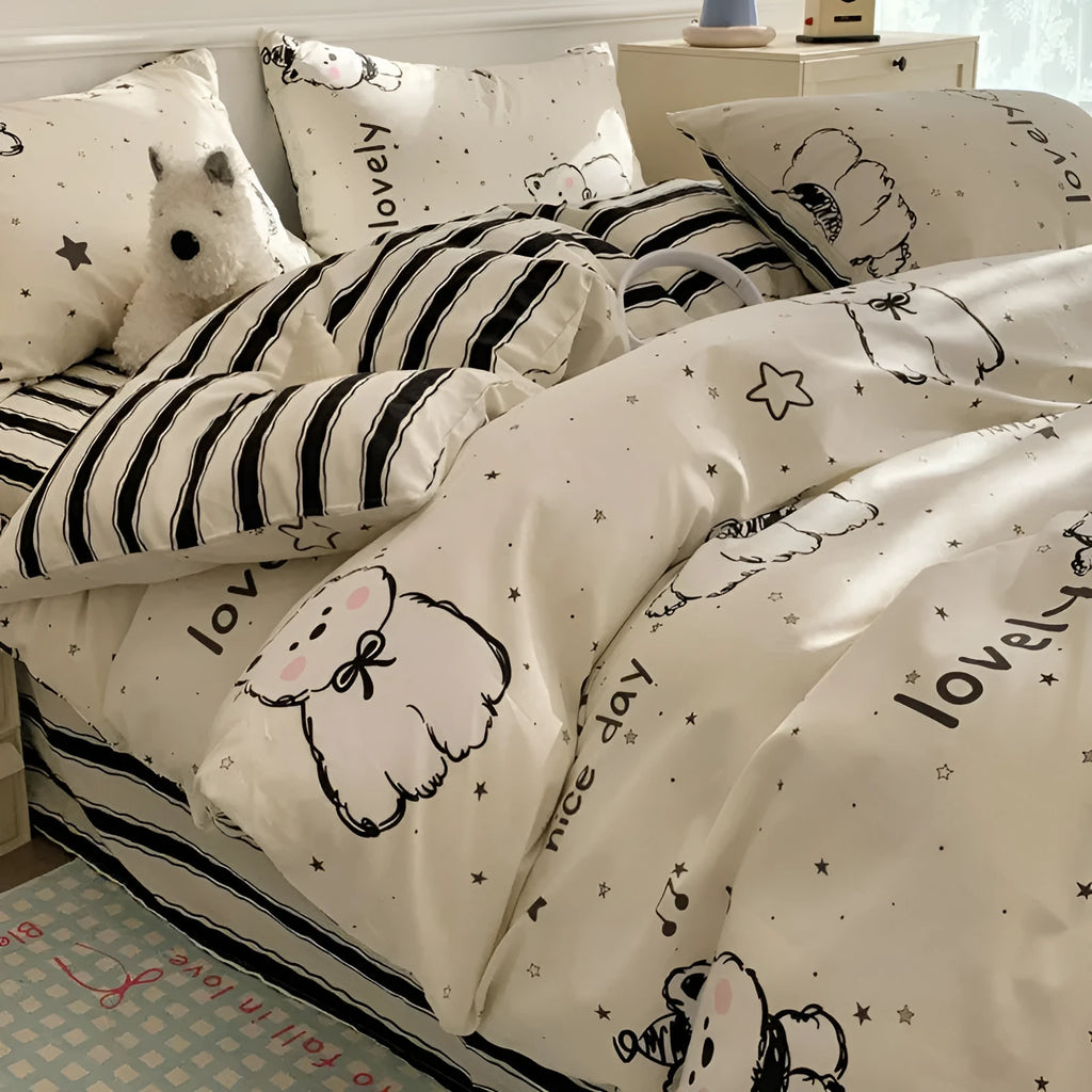 Cartoon dog pattern four-piece cotton bed sheet set showing bedding components