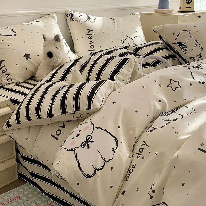 Cartoon dog pattern four-piece cotton bed sheet set showing bedding components