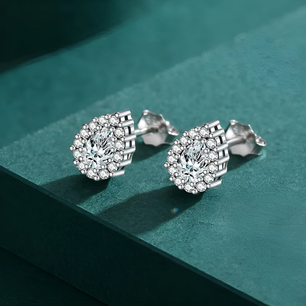 Women's drop-shaped silver ear studs in 925 sterling silver with diamond treatment