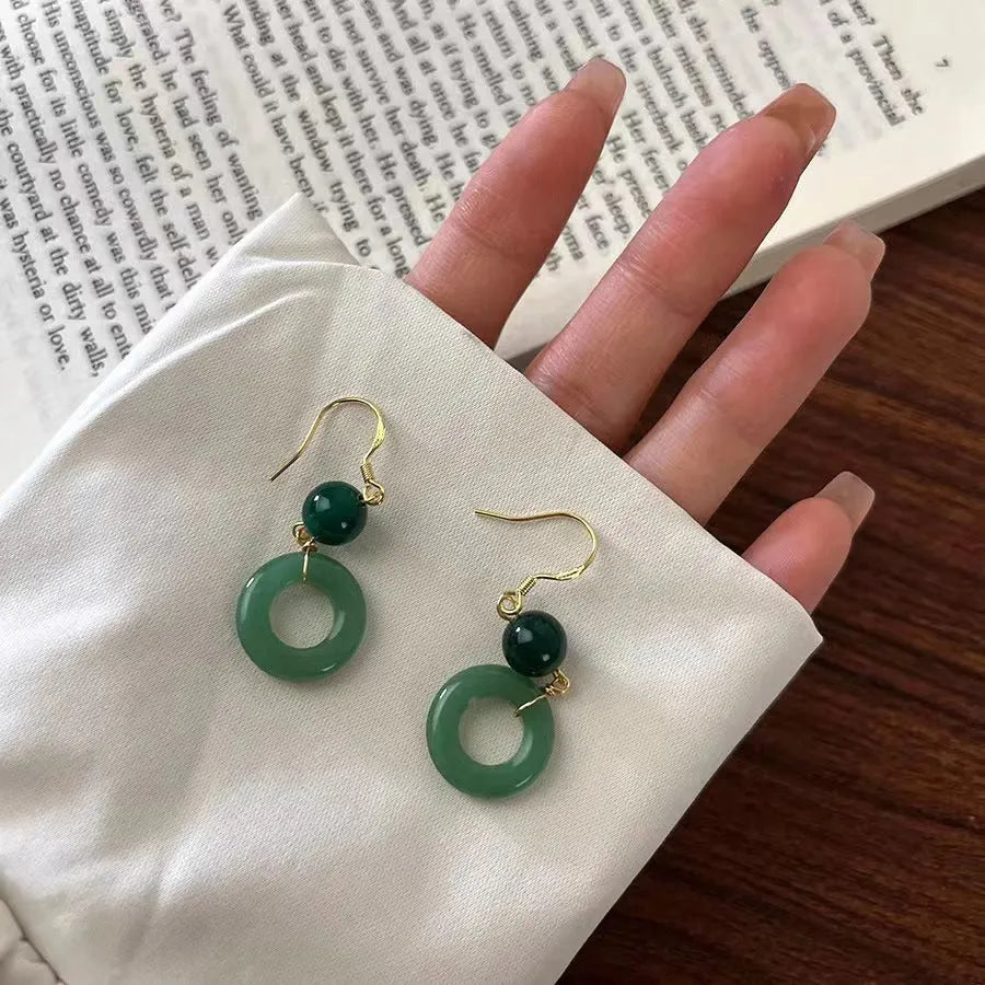 Green jade design geometric peace buckle earrings with 14K gold plating on zinc alloy