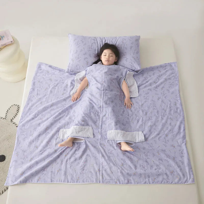 Light blue anti-kick summer blanket with antibacterial filler on a bed