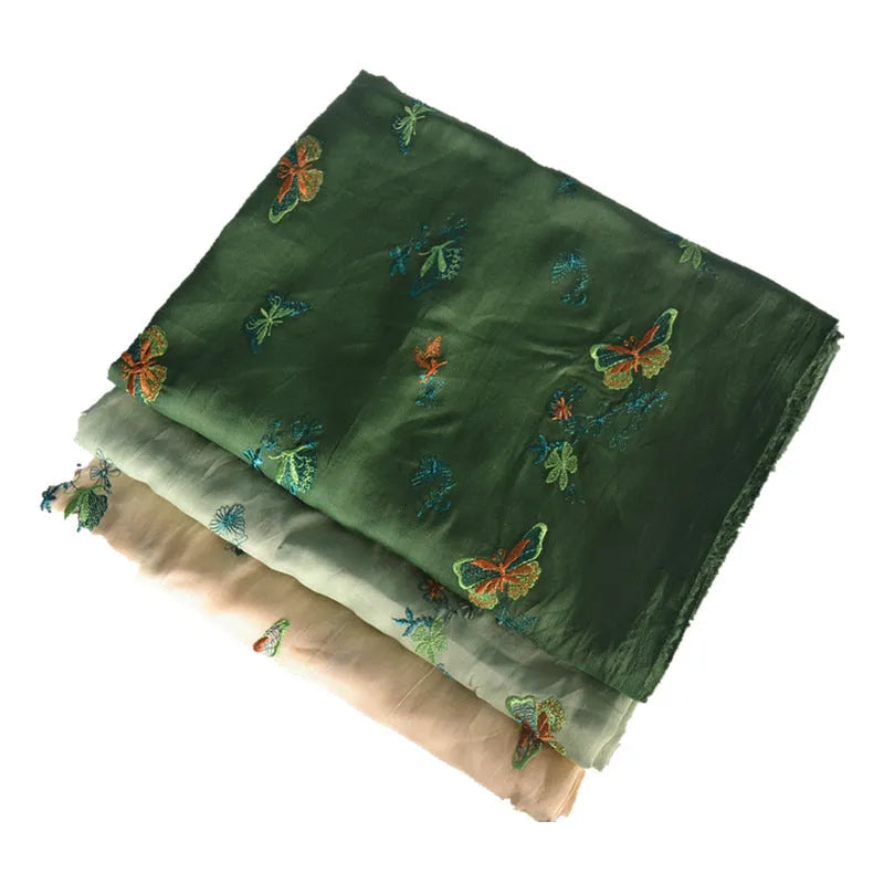 Pure ramie fabric for Hanfu making in beige, grass green, and dark green colours showing 140cm width