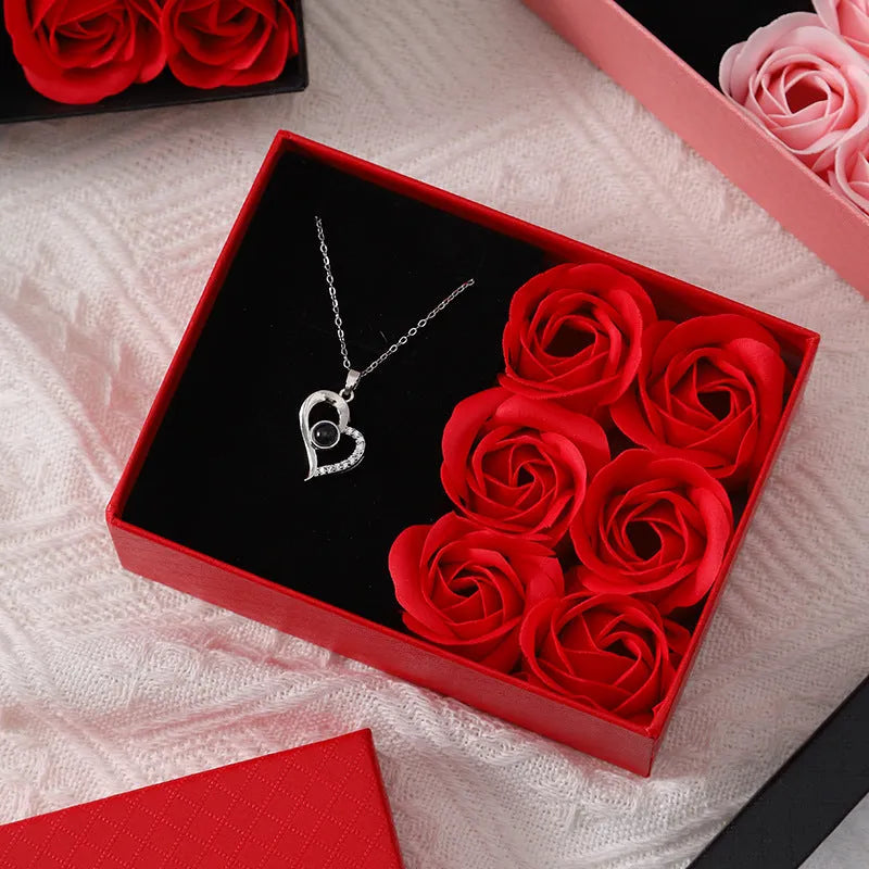 Korean style gift box with six red soap roses and a matching handbag for Valentine's Day.
