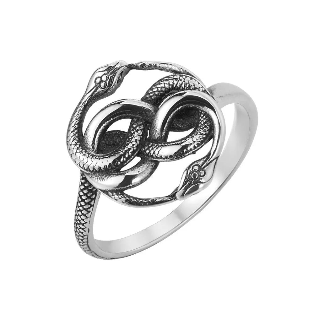 Steel-coloured titanium steel ring with a detailed double snake design on a grey background.
