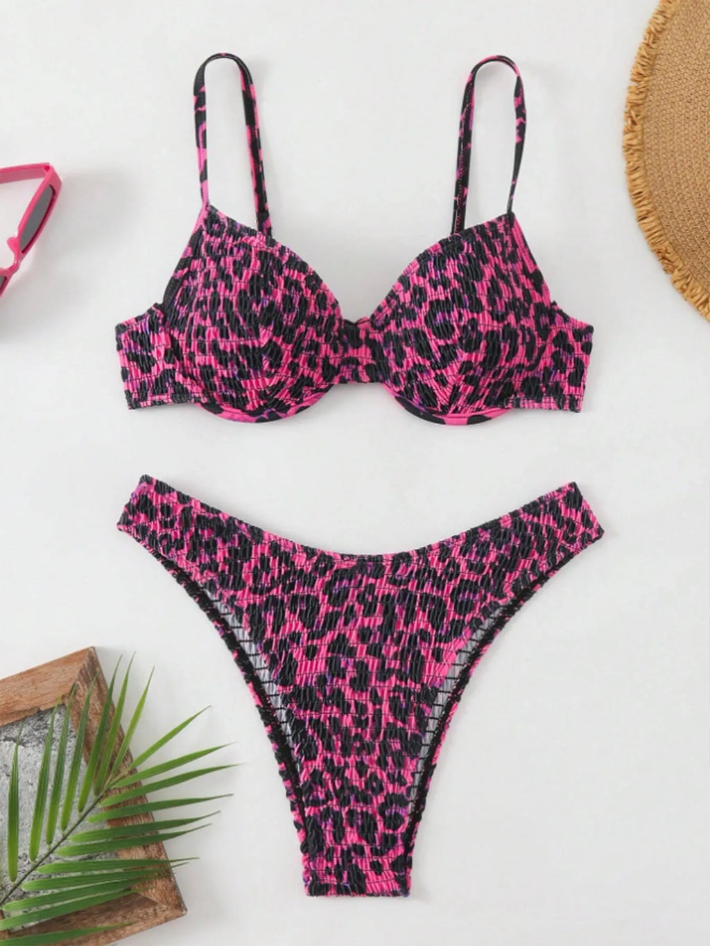 Women's leopard print bikini set with backless design in brown and red mix colours.