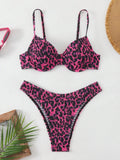 Women's leopard print bikini set with backless design in brown and red mix colours.