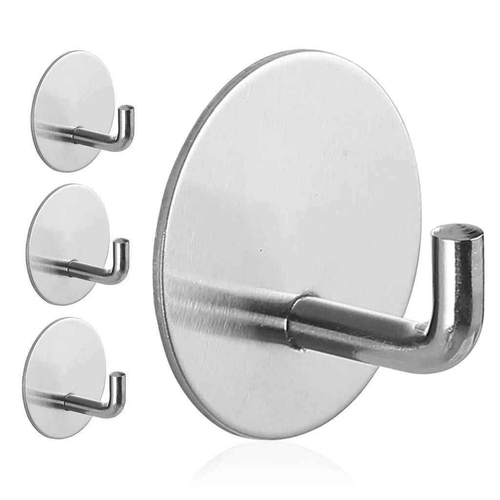 Two stainless steel self-adhesive hooks, one black and one sanded, shown against a surface.
