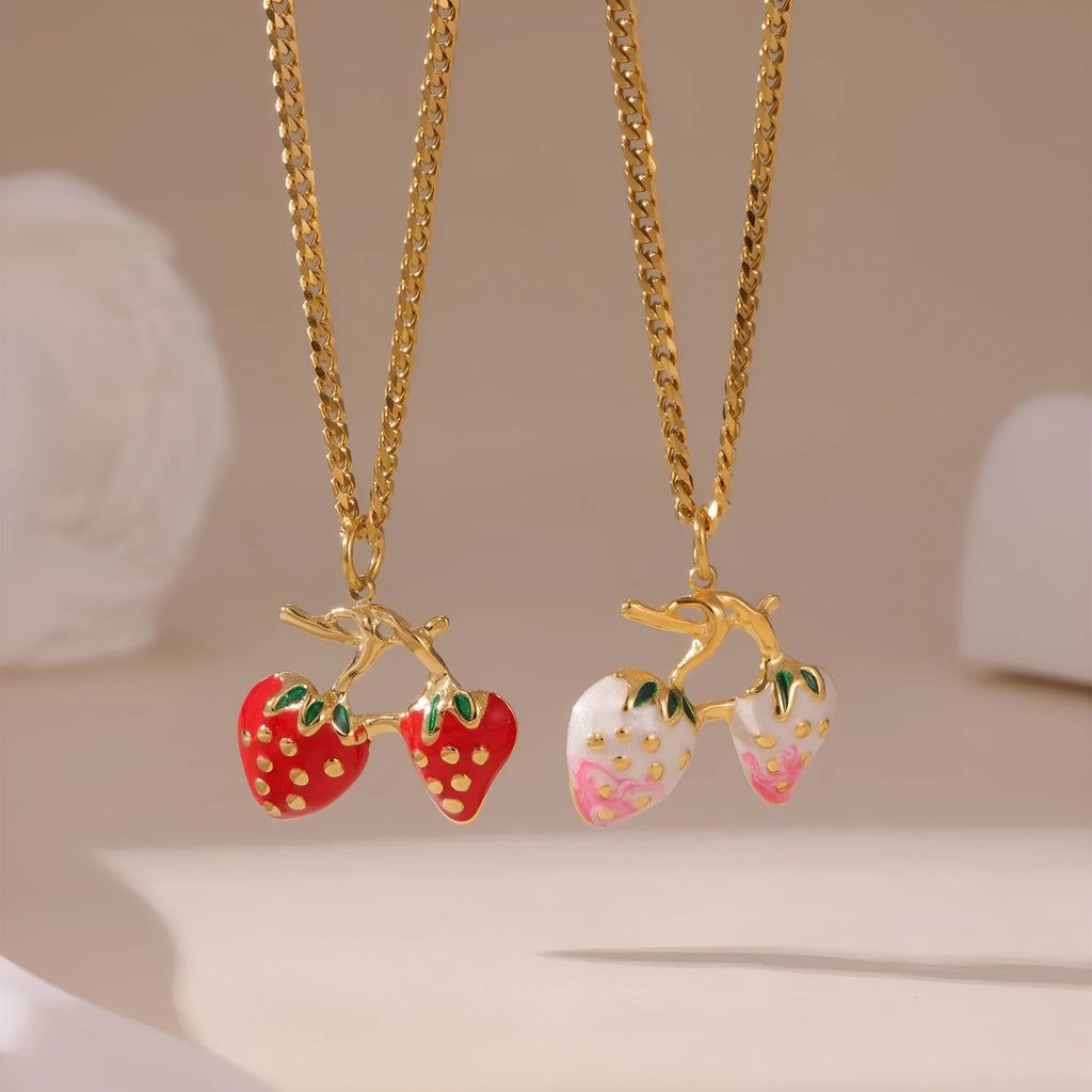 Stainless steel necklace with a detailed strawberry fruit pendant in red or white gradient finish.